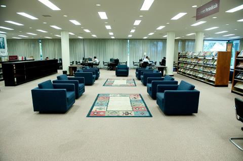 Row of seats among book shelves