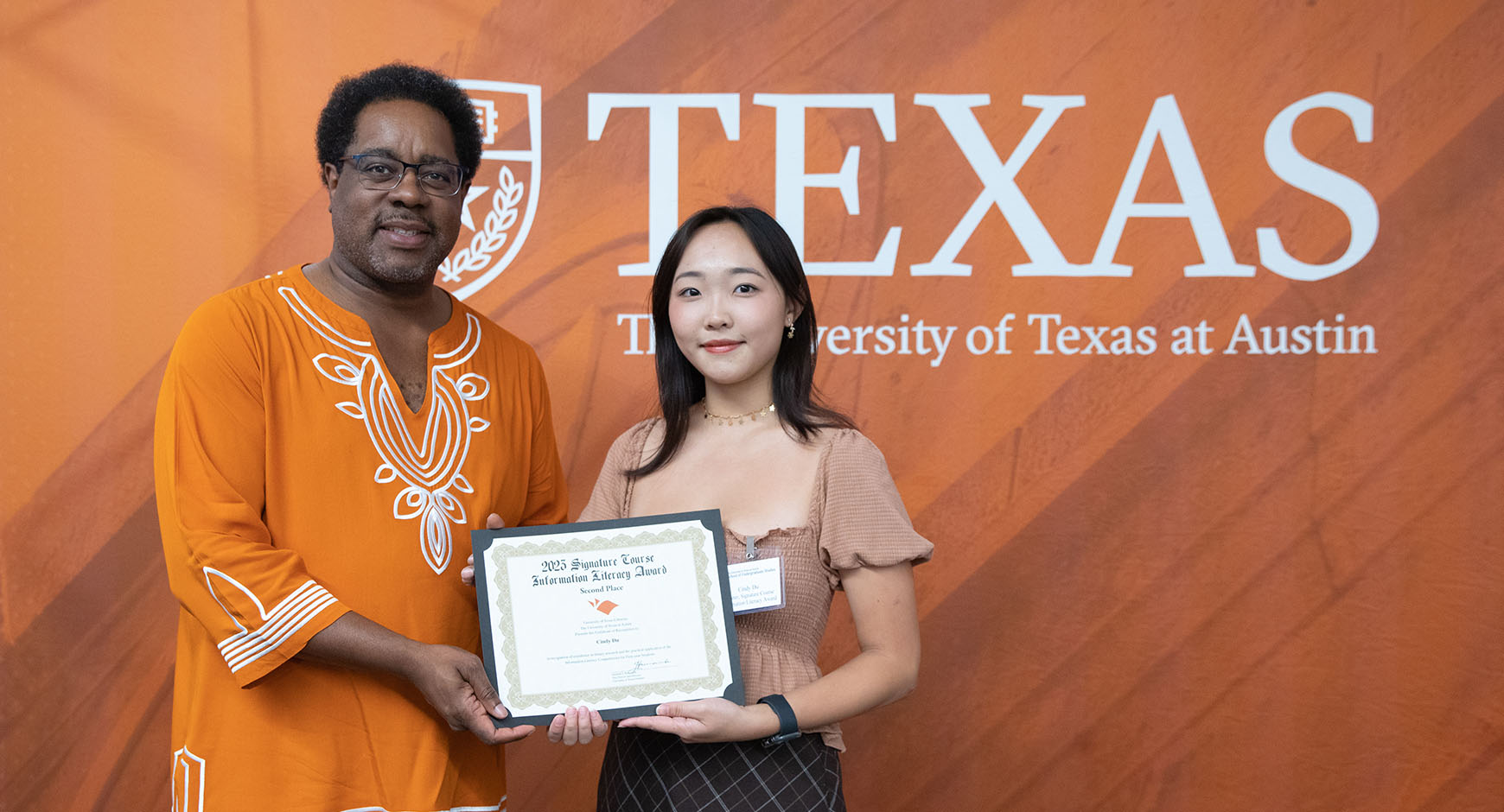 first place info lit award winner Cindy Du with dean of undergraduate studies Richard Reddick